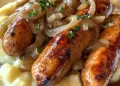  Würstchen und Kartoffelbrei mit Zwiebelsoße