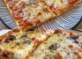  Frisch gebackene Pizza – Mit selbstgemachtem Pizzateig, Tomatensauce, Champignons, Schinken und Käse! 