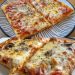  Frisch gebackene Pizza – Mit selbstgemachtem Pizzateig, Tomatensauce, Champignons, Schinken und Käse! 